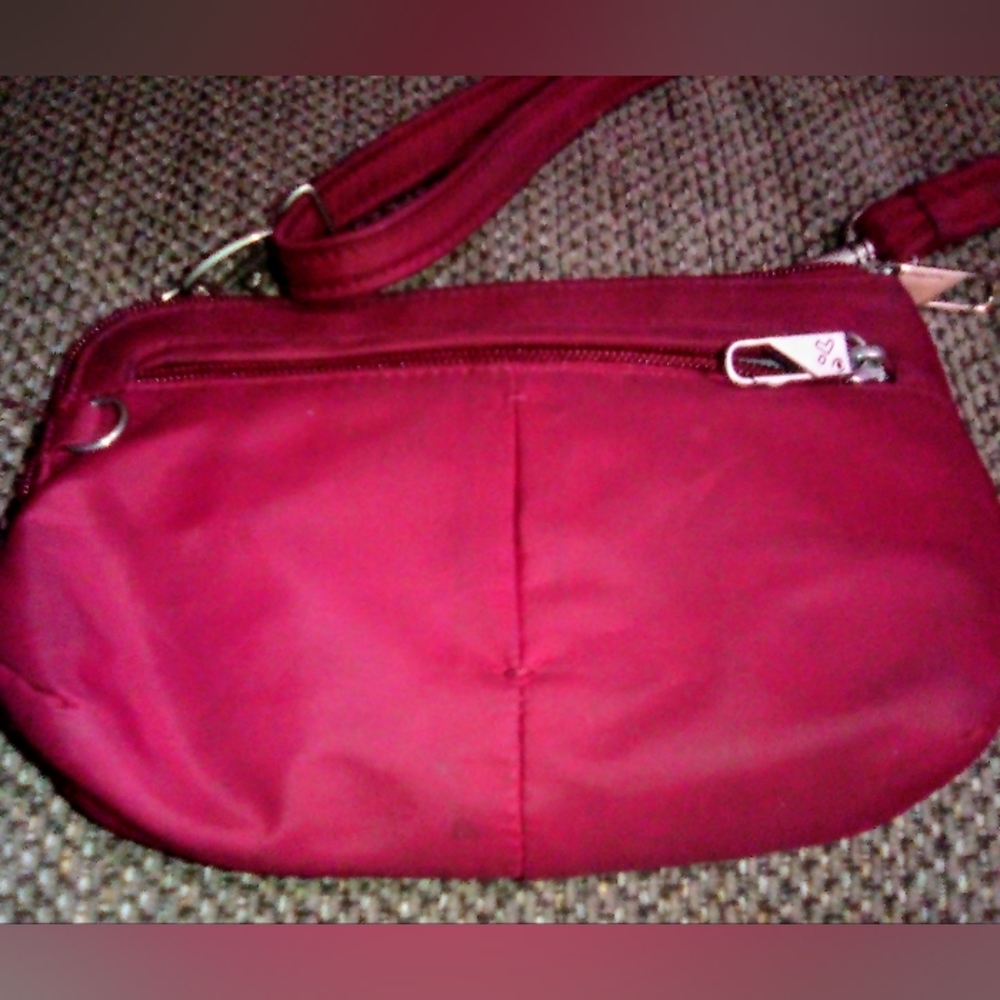 Travelon anti-theft crossbody bag... Select Purses 2 for 13.